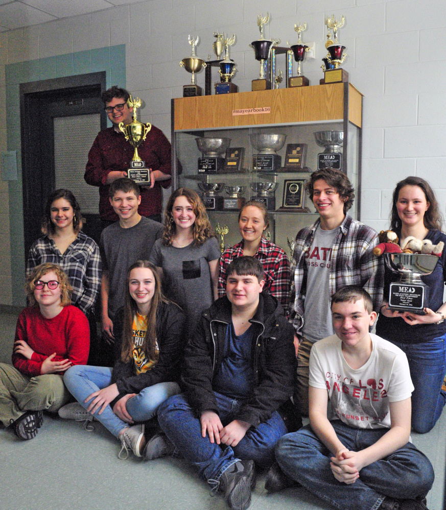 State champion Academic Decathlon team on Wednesday at Monmouth Academy. They are from left, front row, Liliana Stewart, Maddie Amero, Chris Dumont, Gerard Boulet; second row, Emmeline Willey, Dylan Goff, Sammy Grandahl, Madi Bumann, Luke Thombs, Becky Bryant, back row Corey Tatarka.