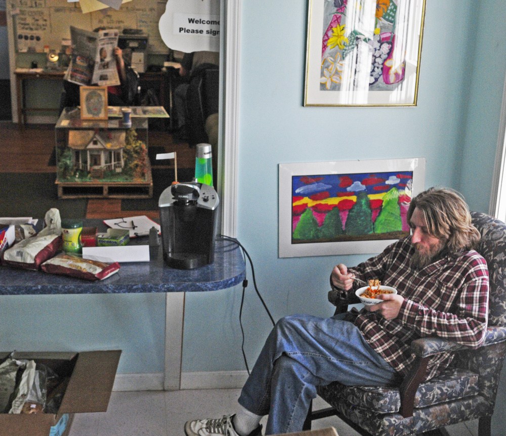 Victor Auger eats a bowl of jambalaya on Friday at LINC Wellness Center in Augusta. The center at the corner of Child Street and Memorial Drive has a daily 3 p.m. meal Monday through Friday.