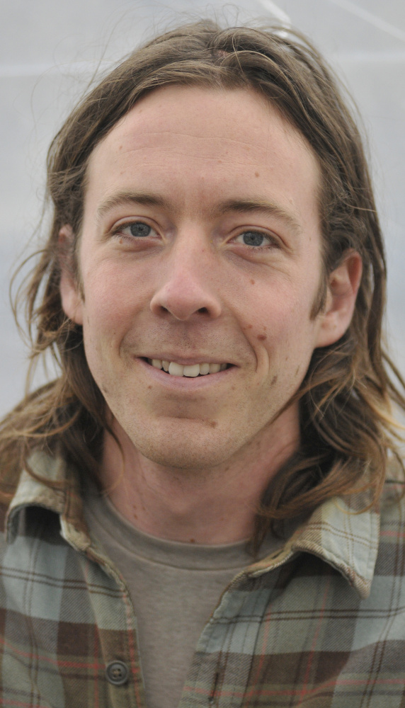 Jon Strieff, of Good Morning Farm, answers questions during an interview on Friday in South China.