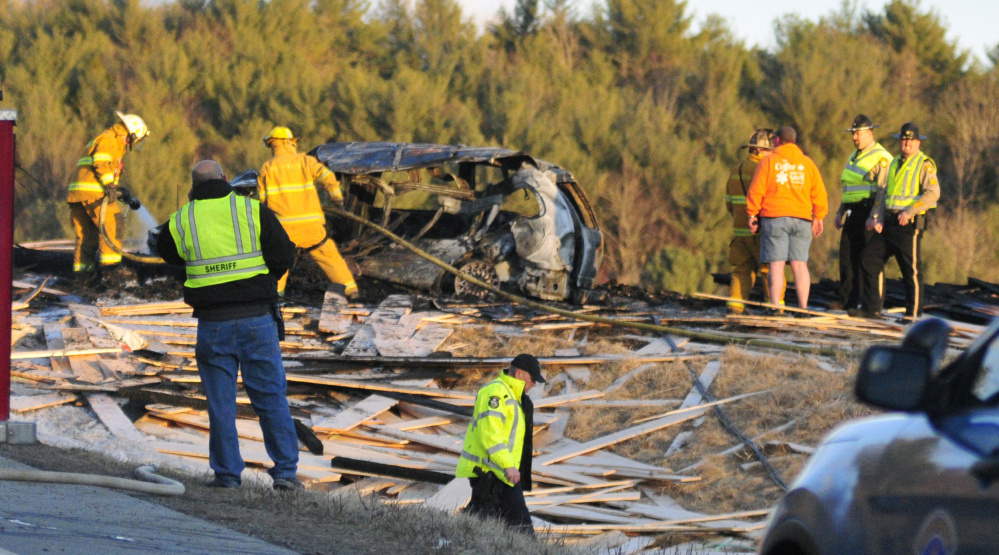 Police and firefighters work at the scene of multi-vehicle accident that took place in March on Route 17 in Washington.