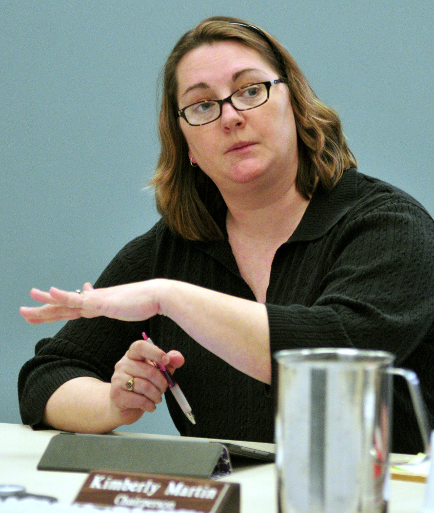 Chairwoman Kimberly Martin answers questions Wednesday during a budget debate at an Augusta school board meeting in the Capital Area Technical Center in Augusta.