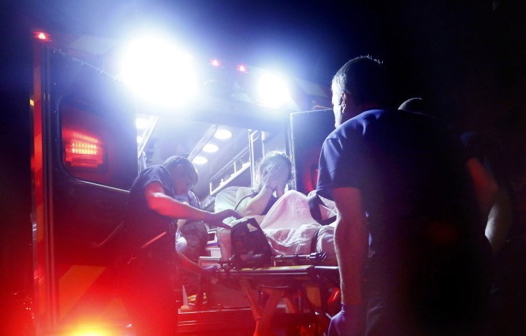 Portland paramedics respond to a reported heroin overdose Aug. 12. In 2014, 3,463 Mainers sought opiate addiction treatment, up from 1,115 in 2010.