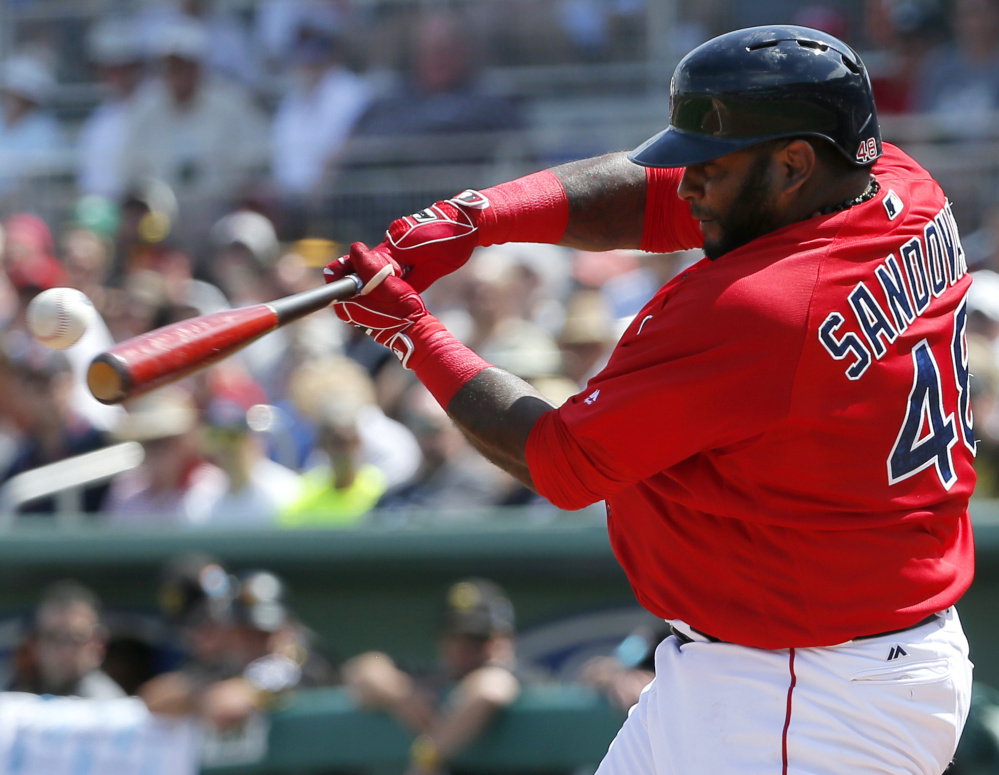Boston’s Pablo Sandoval connects for his first homer of the preseason, a solo shot off Pittsburgh’s Ryan Vogelsong, in the second inning of the Pirates’ 3-1 win in Fort Myers, Fla.