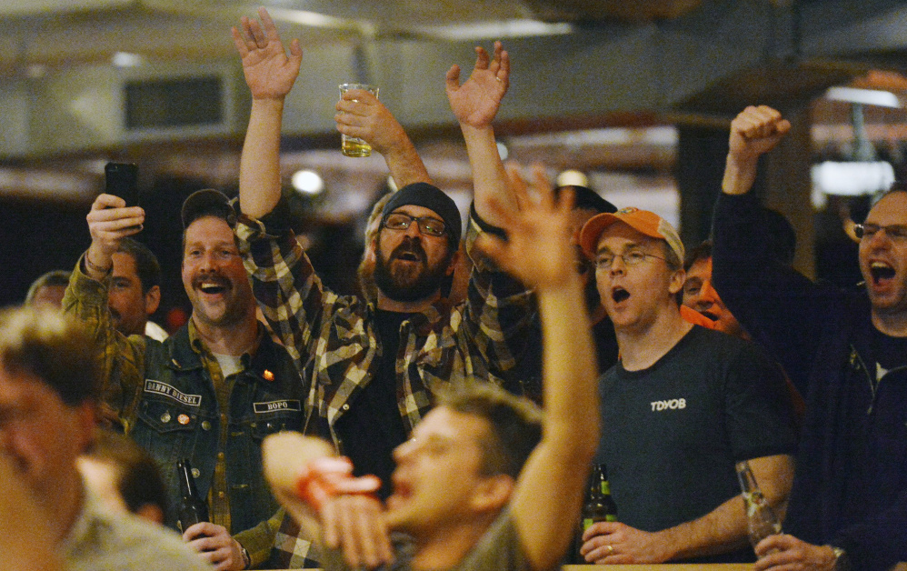 Fans cheer at the Professional Bowlers Association’s pro-am competition last March at Bayside Bowl. “The people embraced us,” said pro bowler Tim Mack.