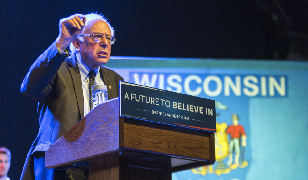 Democratic presidential candidate Sen. Bernie Sanders, I-Vt. speaks at a campaign stop Wednesday in Madison, Wis. Sanders says disastrous trade policies led to the 1996 loss of Milwaukee's Johnson Controls plant to Mexico and the closure of Janesville's General Motors plant in 2008.