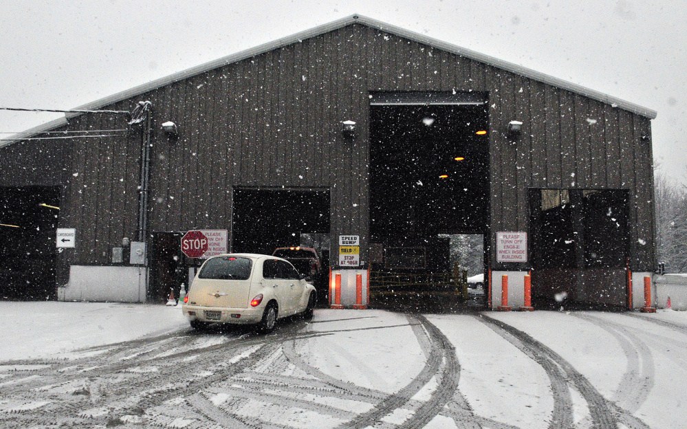 Cars line up at the Winthrop Transfer Station in this February file photo.