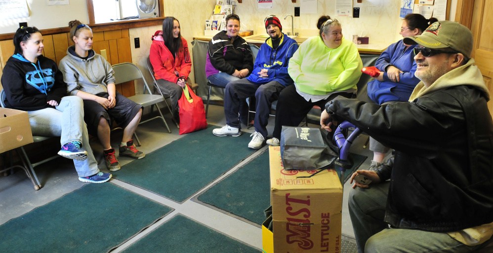 Skowhegan residents fill the waiting room Wednesday before selecting food items at the Skowhegan Food Cupboard.