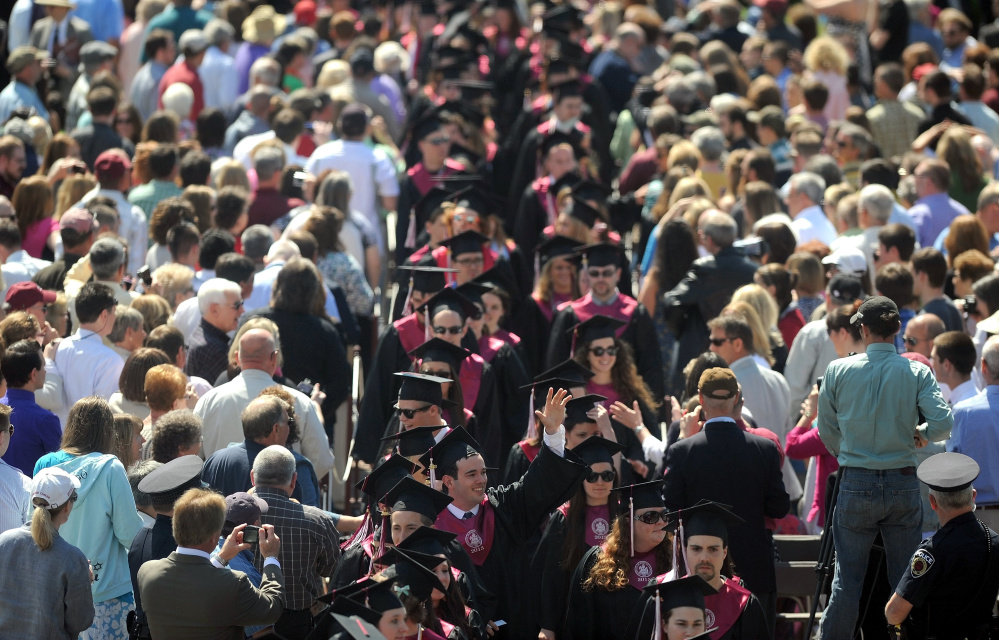 University of Maine at Farmington graduates take their seats in 2014 during commencement ceremonies in Farmington. Two-time Pulitzer Prize winner Alan Shaw Taylor will be the commencement speaker at this year's ceremony, set for May 14. Taylor, a Colby College graduate, is a historian who teaches at the University of Virginia.