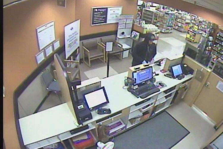 The Kennebec County Sheriff's Office released this surveillance photo Monday night from the Hannaford supermarket in South China. It shows the man who reportedly robbed the pharmacy there.