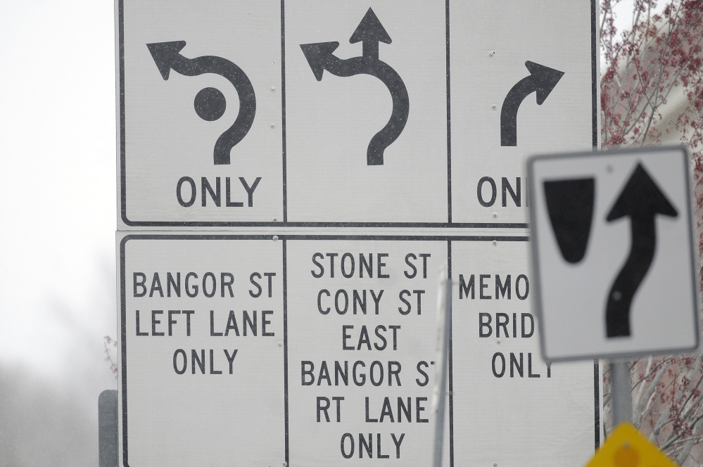 A directional sign on Tuesday at Cony Circle in Augusta.