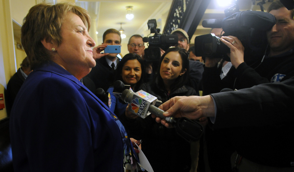 Sen. Susan Deschambault of Biddeford answers reporters' questions after being sworn into office, four days after her originally scheduled swearing-in.