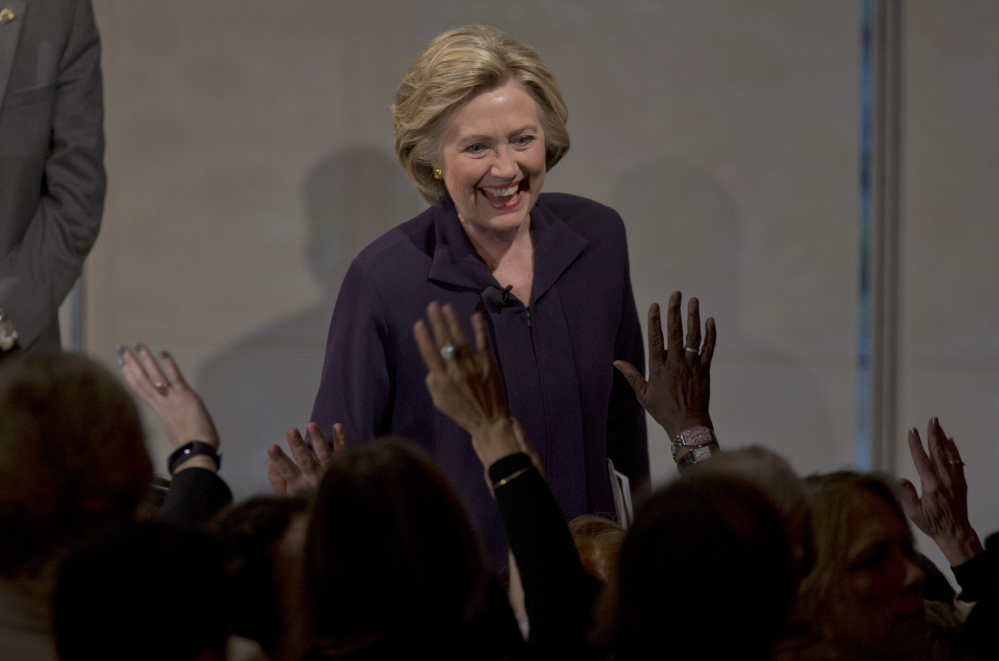 Democratic presidential candidate Hillary Clinton greets members of the audience during a Glassdoor Pay Equality Roundtable on Tuesday in New York.