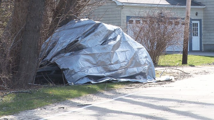 The crash site on Old Ocean House Road. Cape Elizabeth Police Chief Neil Williams told WCSH-TV Saturday that "we didn't want to move the car until we had an arborist look at it to think it was safe."