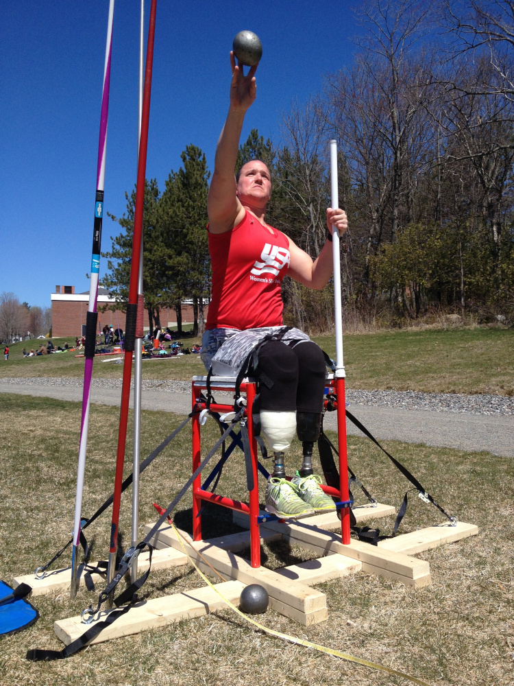 Christy Gardner throws the shot Saturday at Maine Central Institute in Pittsfield.