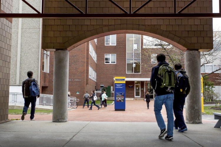 Students change classes Tuesday near Luther Bonney Hall at the University of Southern Maine in Portland. At USM, which also has campuses in Gorham and Lewiston, enrollment for fall 2016 has so far risen by 10 percent to 563 first-year students.