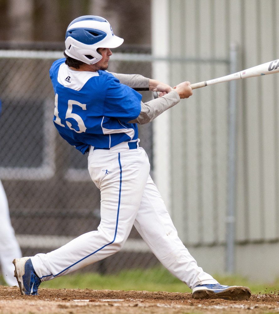 Erskine Academy's Nick Turcotte connects with the ball against Maranacook on Tuesday in Readfield.