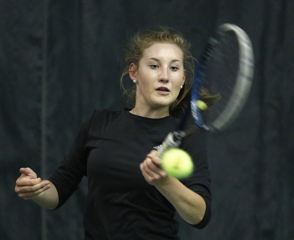 In this June 1, 2015 photo, Bethany Hammond, of St. Dominic Academy, returns a shot in the girls tennis singles state championship matches. Hammond, of Belgrade, won the mixed doubles division with Cole Ouellette, of Lewiston, at the Hall-Dale Invitational on Saturday at Hall-Dale High School.