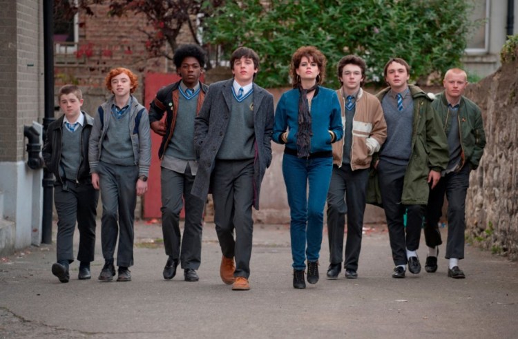 From left are Karl Rice, Ben Carolan, Percy Chamburuka, Ferdia Walsh-Peelo, Lucy Boynton, Mark McKenna, Conor Hamilton and Ian Kenny in "Sing Street."