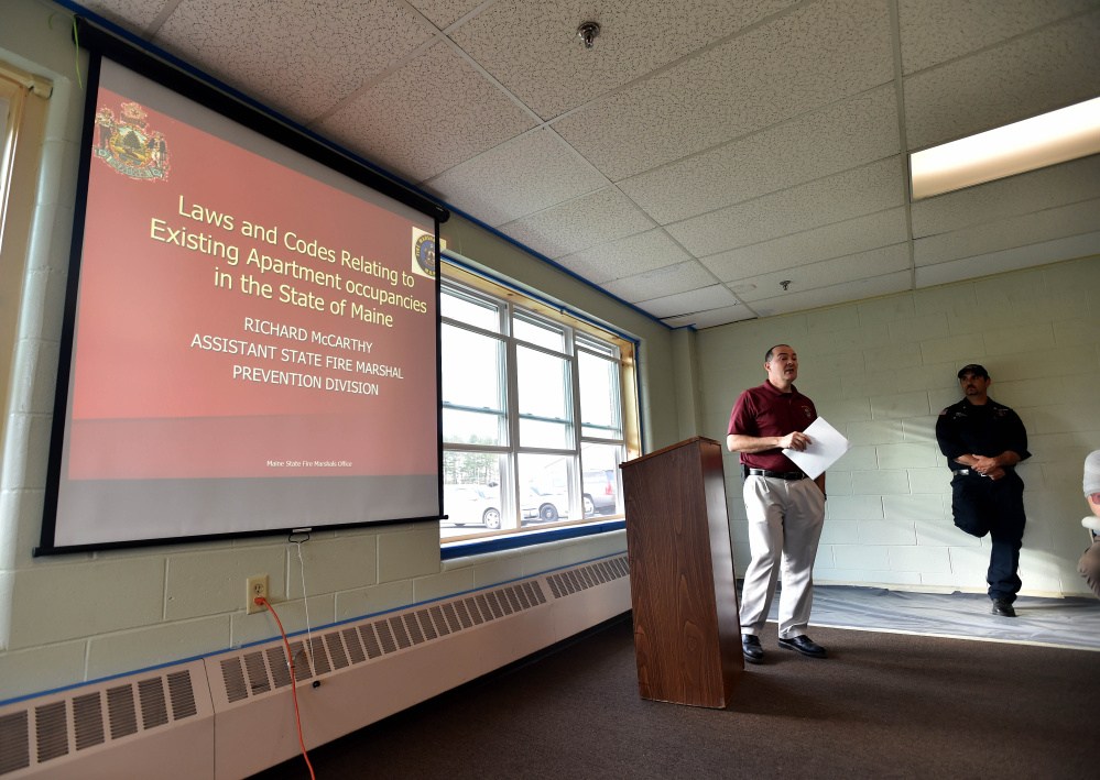 Richard McCarthy, assistant state fire marshal, speaks to landlords about fire safety during a fire safety conference for landlords at the Skowhegan Community Center on Wednesday.
