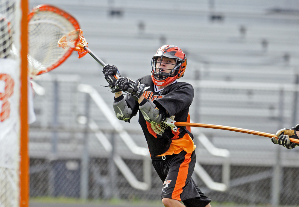 Winslow's Isaac Lambrecht shoots during a game against Gardiner on Thursday in Gardiner.