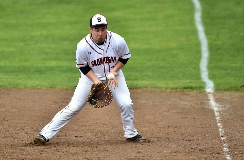 Skowhegan first baseman Oakley Fortin fields a hard-hit grounder during a Kennebec Valley Athletic Conference Class A game against Lawrence last Tuesday at Memorial Field in Skowhegan. The Indians won, 4-0.