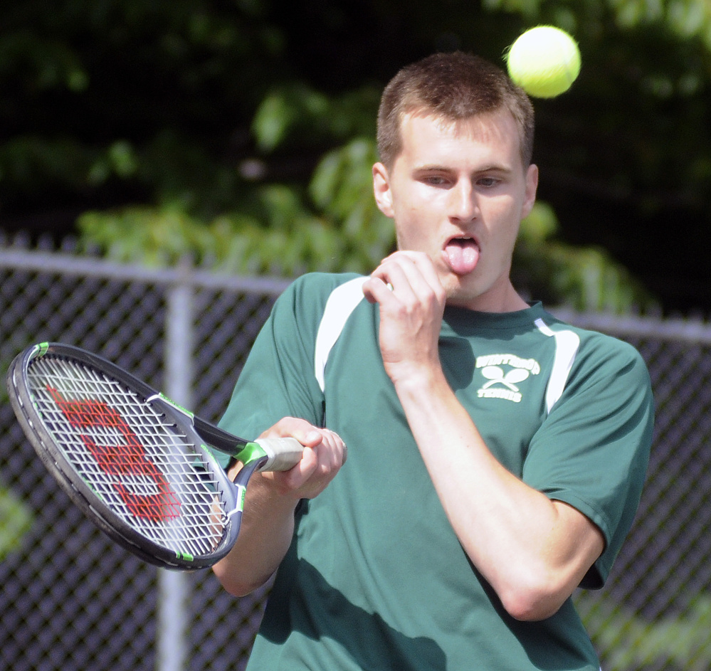 Winthrop High School's Garrett Tsouprake returns a ball during a doubles match against Hall-Dale High School on Thursday in Farmingdale.