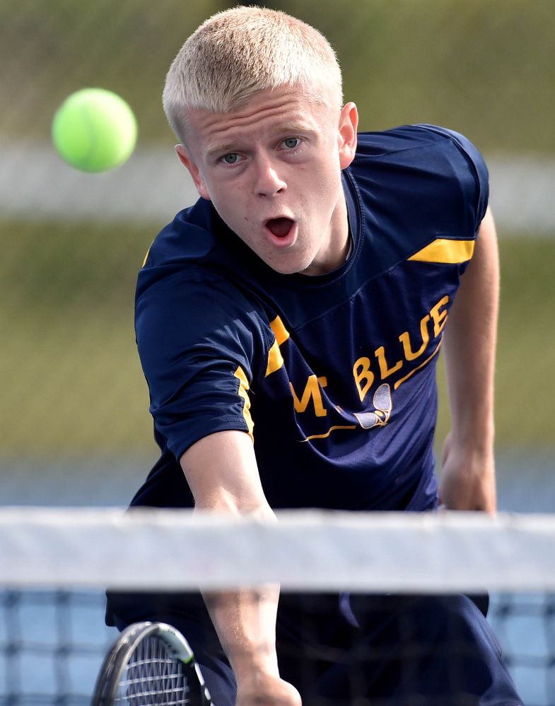 Mt. Blue High School's Evan Backus competes against Mt. Ararat's Nick Mathieu during a Class A North quarterfinal match Thursday in Farmington.