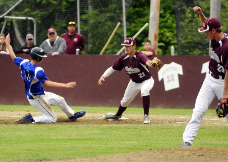 Sacopee Valle's Brandon Burnell, left, is out when he can't get back to first on a double play against Monmouth during a Class C South semifinal game Saturday in Monmouth. A popup went to Monmouth pitcher Hunter Richardson, right, who flipped it to first baseman Travis Hartford for the second out.