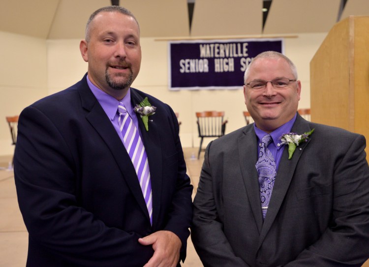 Brian Laramee, left, principal of Waterville Senior High School, and assistant principal Joseph Haney stand together Thursday during the class of 2016 commencement ceremony at Colby College in Waterville.
