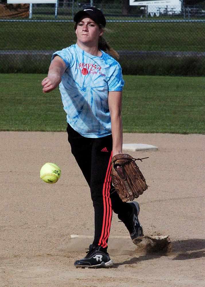 Skowhegan's Sydney Ames pitches during practice Monday in Skowhegan.