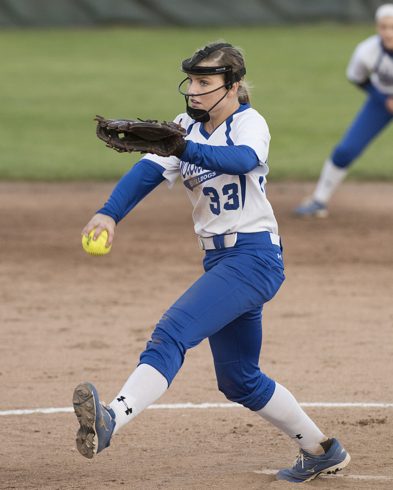 Madison's Madeline Wood throws a pitch across the plate against Lisbon during third-inning action of the Class C South regional championship game Tuesday in Standish. Madison won 12-0.