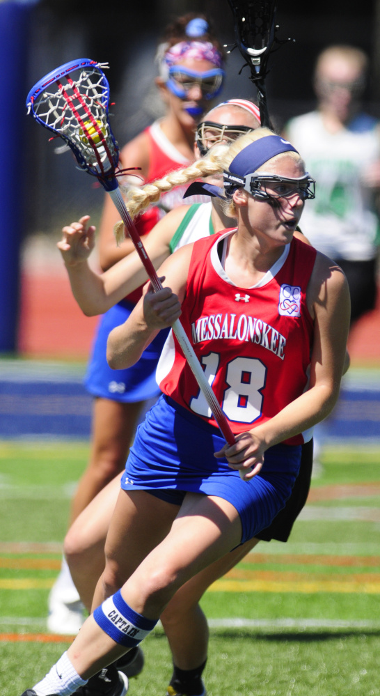 Messalonskee senior captain Nathalie St. Pierre carries the ball during the Class A state title game against Massabesic on Saturday morning at Fitzpatrick Stadium in Portland. St. Pierre would later score the game-winning goal in overtime.