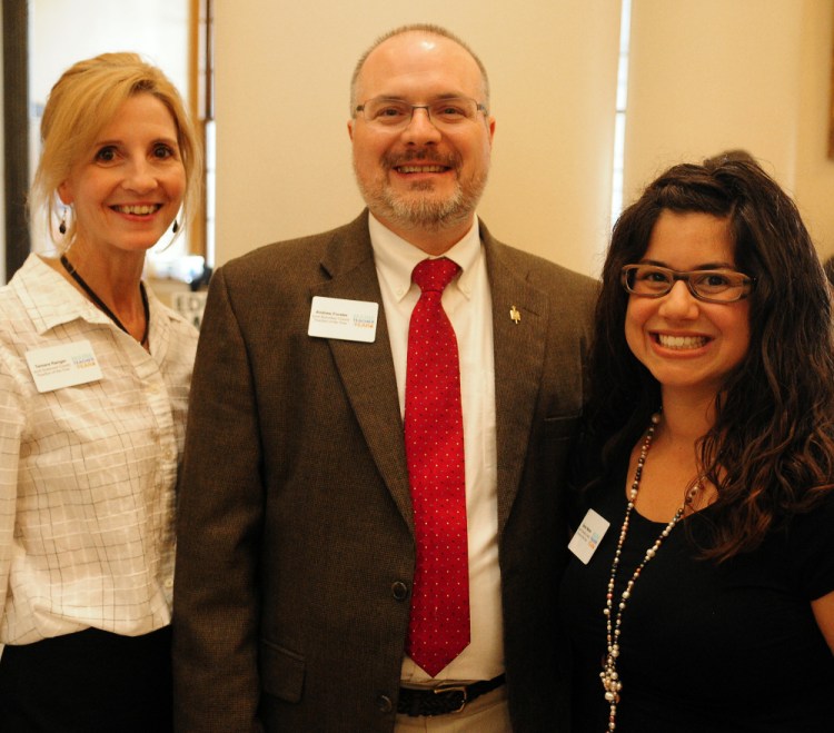 Somerset County teacher of the year Tamara Ranger, left, Kennebec County teacher of the year Andrew Forster, and Franklin County teacher of the year Selina Warren pose for group photo May 13 in the State House Hall of Flags in Augusta. Ranger, Forster and Warren were all announced Thursday as semifinalists for the Maine 2017 Teacher of the Year award, which will be given out in October.