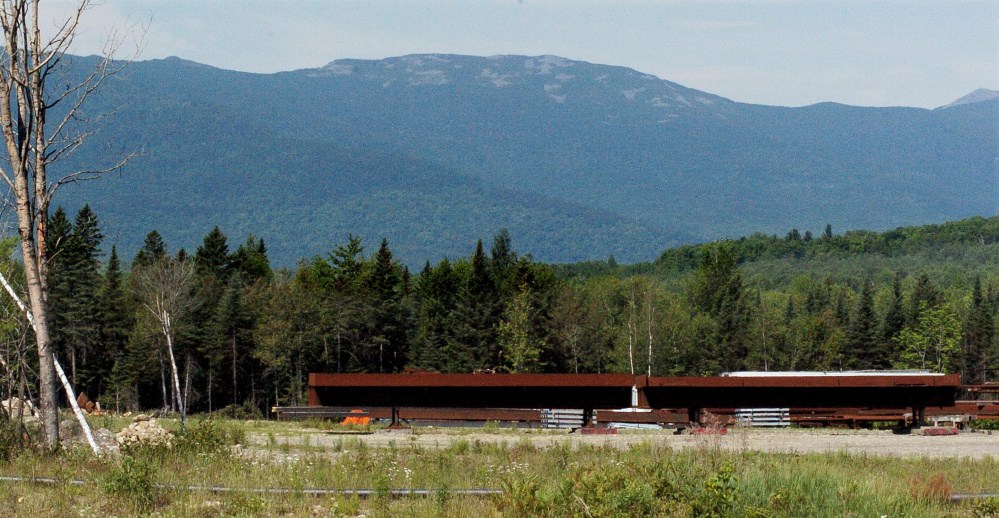 Mount Abram, where a fire has been burning at the summit for nearly a week, is seen Monday from Kingfield. The Maine Forest Service expects the firefighting effort to continue for several days, officials said Tuesday.