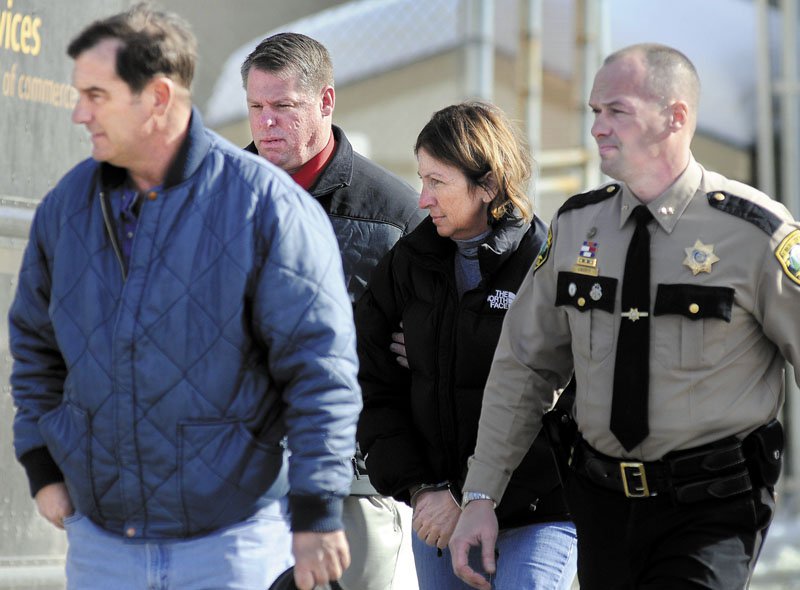 Marshall Swan, far left, is expected to be released from federal prison July 15 after serving a sentence for falsifying five years' worth of tax returns.