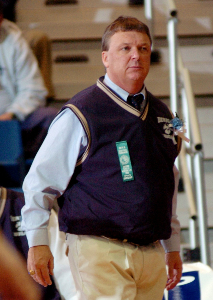 Former Dirigo boys basketball coach Gavin Kane watches the action during a 2006 tournament game at the Augusta Civic Center. Kane coached the Mt. Blue girls team the last two seasons, going 20-16. However, he resigned this week, citing a change in sports culture.