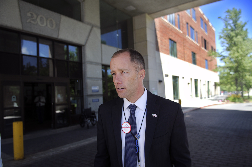 VA Maine Healthcare Systems-Togus Director Ryan Lilly walks through the hospital Monday during a tour of the facility.