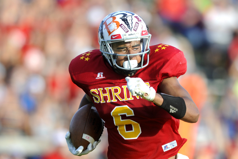 East's Andre Miller, of Old Town, runs for a touchdown during the annual Maine Shrine Lobster Bowl on Saturday in Biddeford.