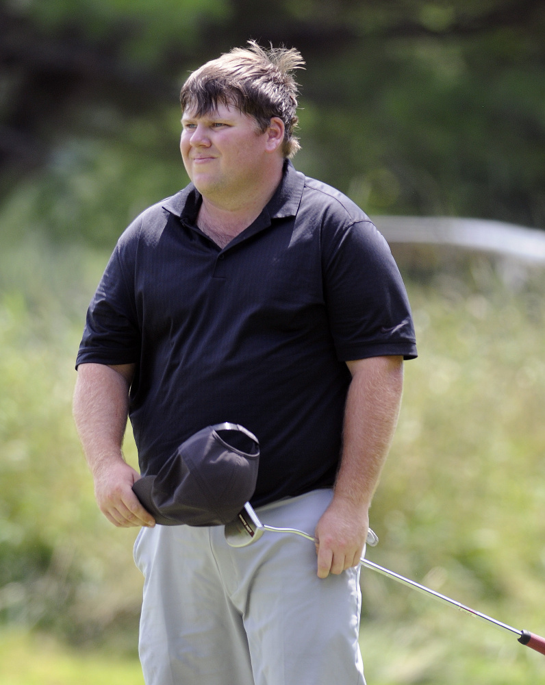 Ryan Gay takes off his cap after finishing his round at the Maine Open at the Augusta Country Club in Manchester on Monday. Gay shot a 1-under 69.