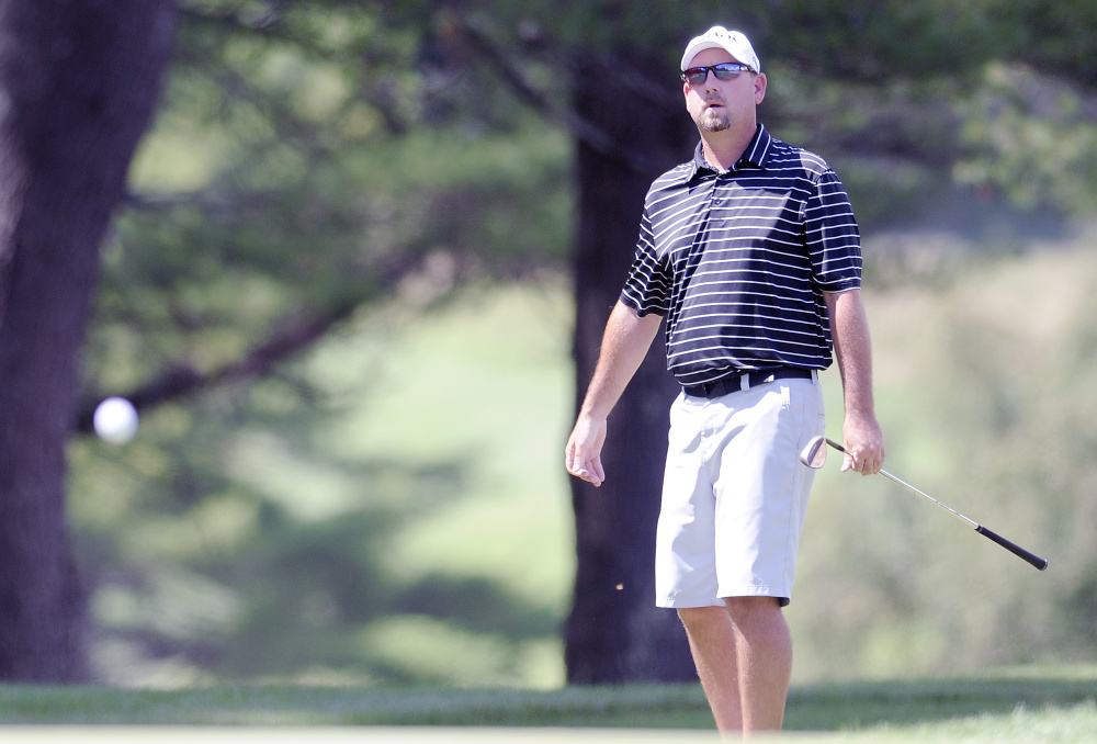 Ted Brown watches his ball down the fairway during the final round of the Maine Open at the Augusta Country Club in Manchester on Tuesday. Brown won the tournament with a two day score of 7-under par.