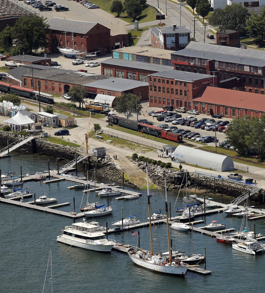 The site of the former Portland Co. complex now includes former locomotive factory buildings and a 61-slip marina.