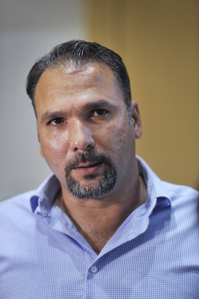 Aqeel Mohialdeen publishes the Iraqi language newspaper "Hanging Gardens" and attended the meeting in Westbrook.