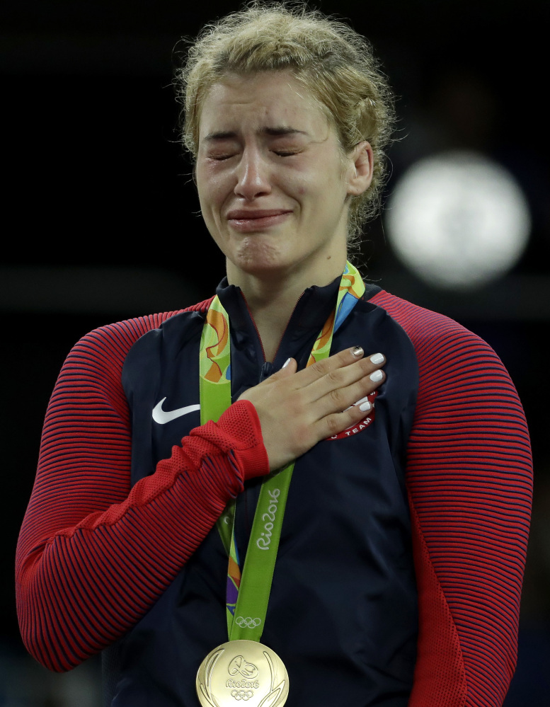 United States' Helen Louise Maroulis celebrates after beating Japan's Saori Yoshida for the gold during the women's wrestling freestyle 53-kg competition at the 2016 Summer Olympics in Rio de Janeiro, Brazil, Thursday, Aug. 18, 2016. (AP Photo/Charlie Riedel)