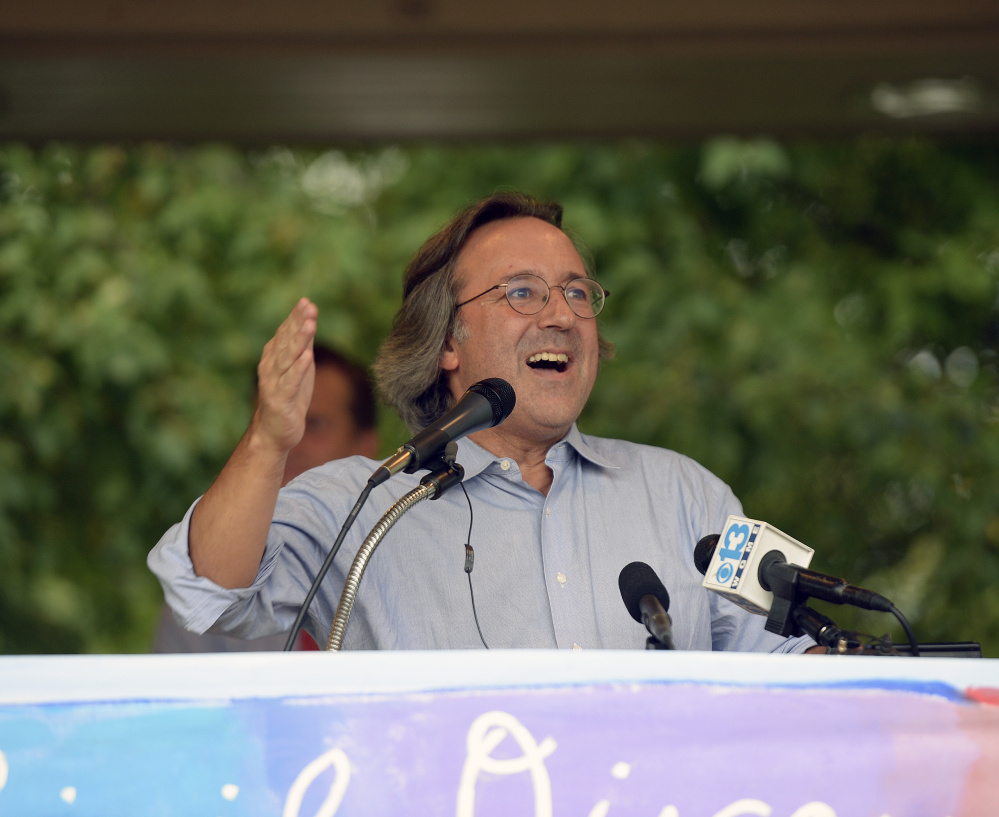 State Rep. Drew Gattine addresses the rally Wednesday in Westbrook. "I have never felt so loved, appreciated and supported as I have in the last week," he said.