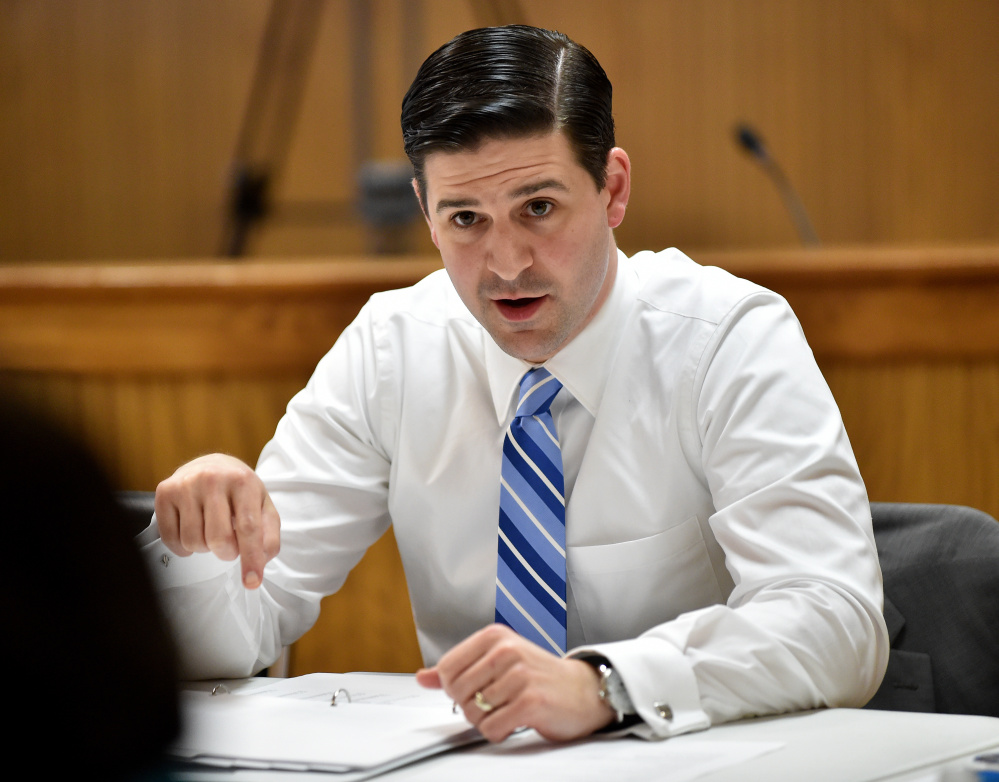 Mayor Nick Isgro speaks with council members in March.