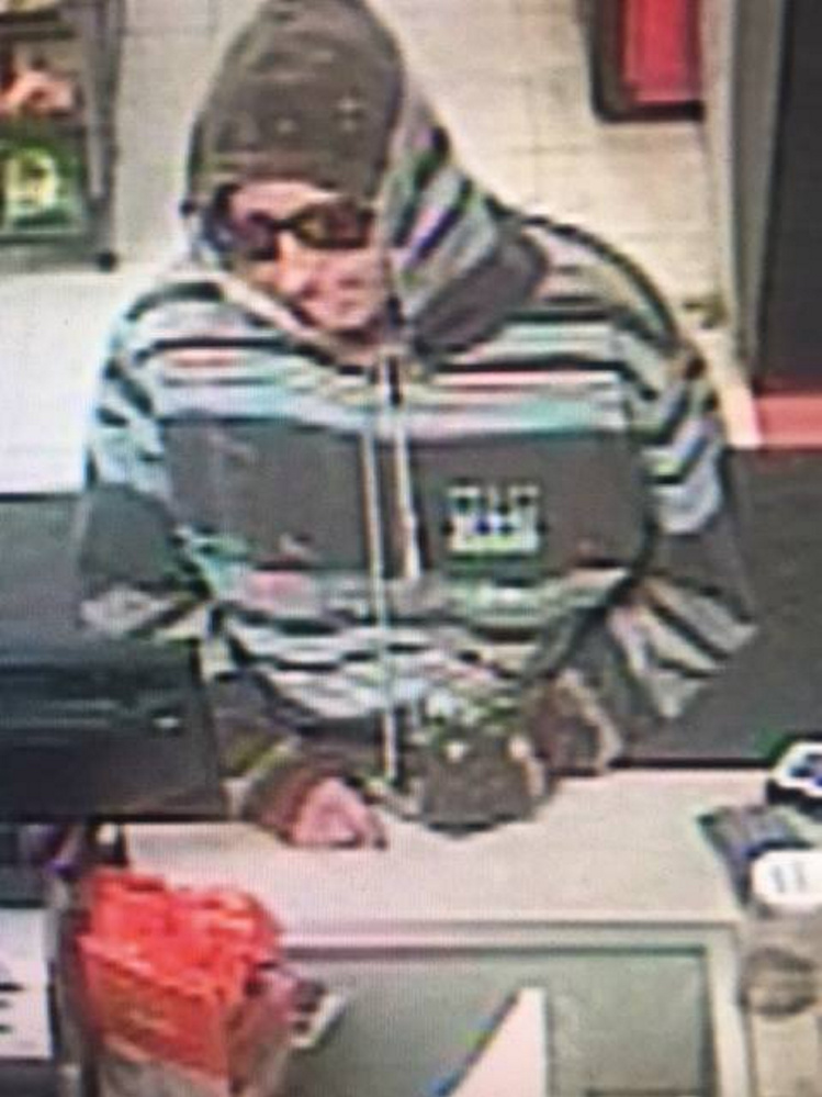 Police released this surveillance photo in connection with a June 21 robbery at The Big Apple store on Stone Street.