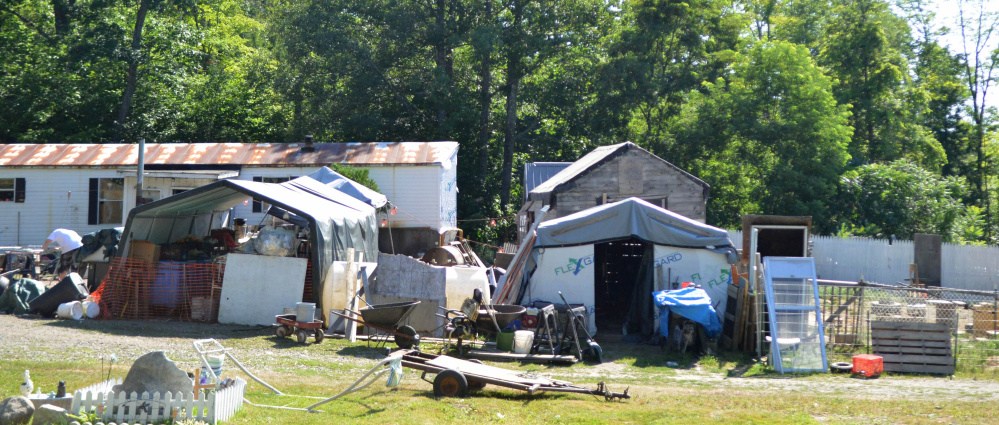 The Oakland Town Council discussed the status of 8 Smithfield Road and the junk on the property Wednesday night, and whether it was in violation of town ordinance.