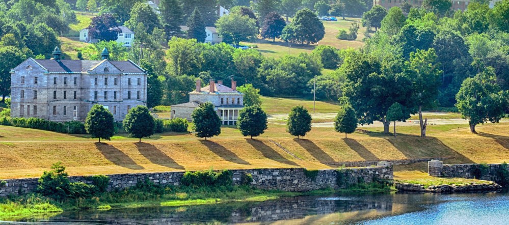 The hillside leading down to granite dock below the Kennebec Arsenal in Augusta shows evidence of recent mowing Friday.