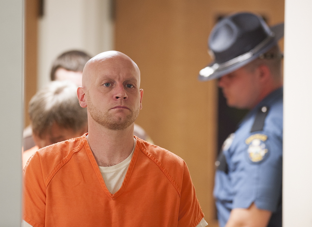 Robert Burton enters Piscataquis County Superior Court in August 2015 for his initial court appearance. Burton, who turned himself in after a nine-week manhunt following the June 5, 2015, fatal shooting of Stephanie Ginn Gebo in Parkman, was scheduled to go on trial Monday, but that's on hold while he finds a new attorney.