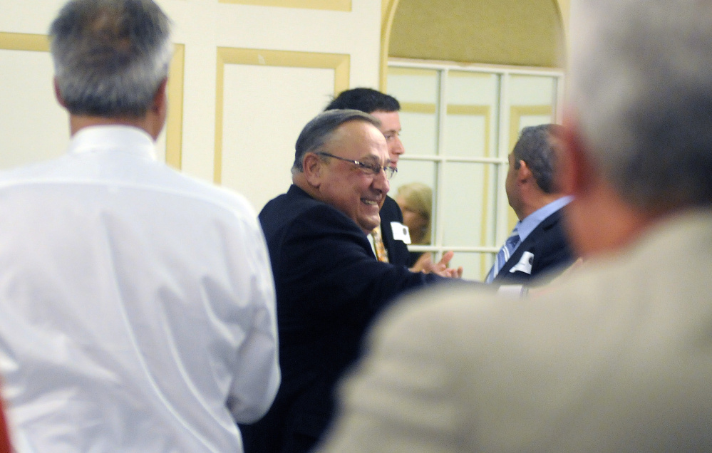 Gov. Paul LePage is greeted with a standing ovation by the members of the Kennebec Valley Chamber of Commerce before speaking to the group Wednesday in Augusta.